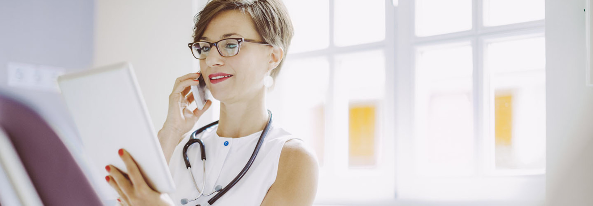 Female doctor with iPad