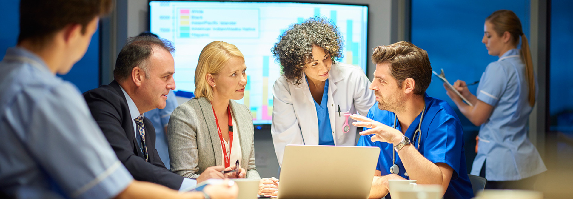 Doctors meeting with tech consultants 