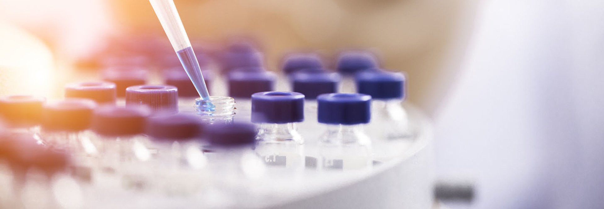 Female chemist at work in laboratory.