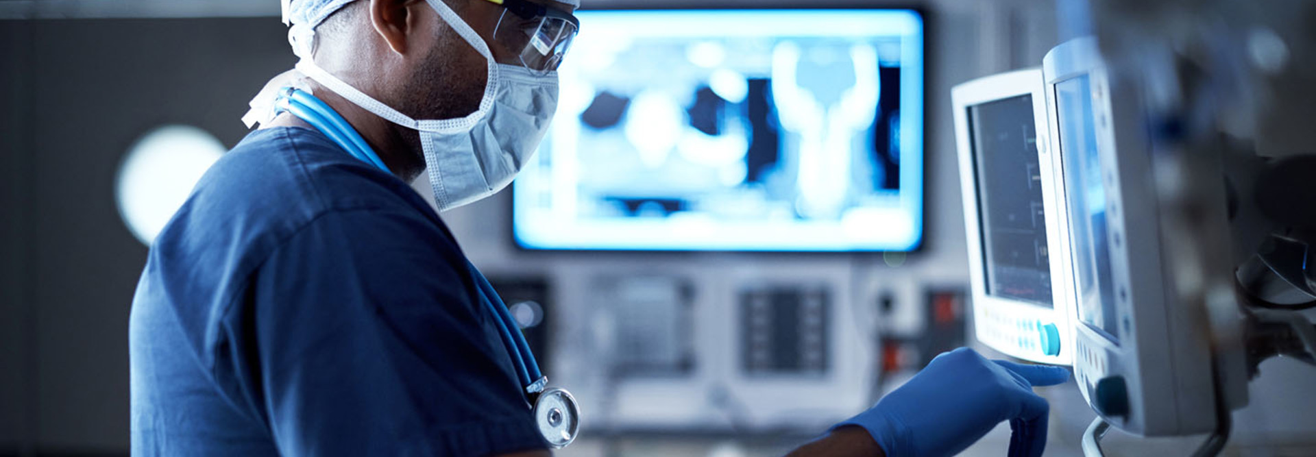 Vigilantly monitoring his patient's vitals