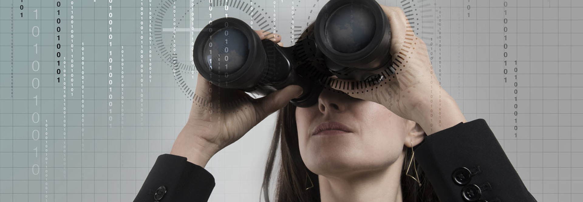 woman holding binoculars