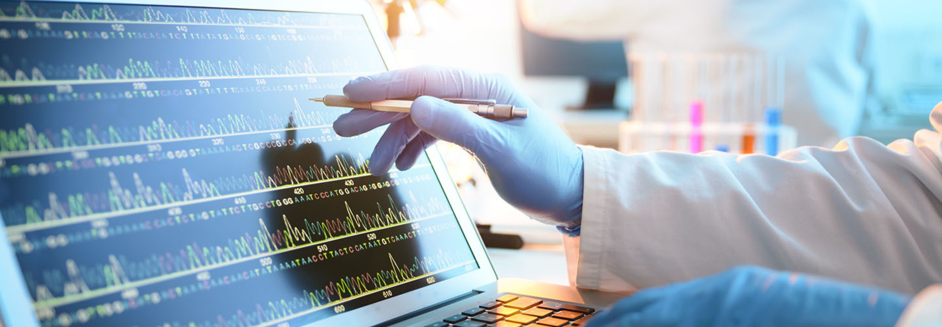 A scientist looking at a DNA sequence