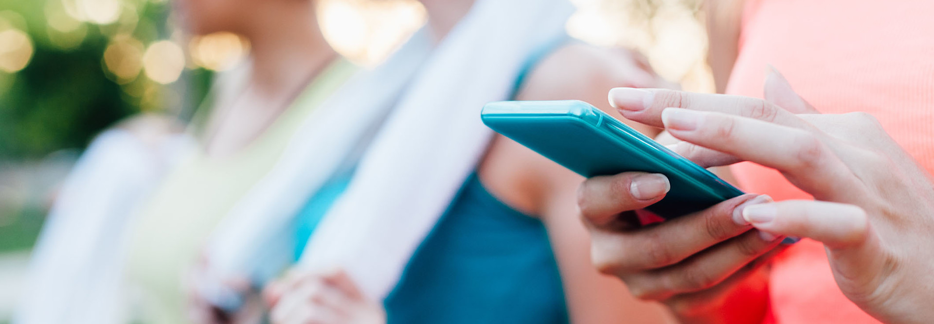 Sports woman checking fitness result on mobile phone