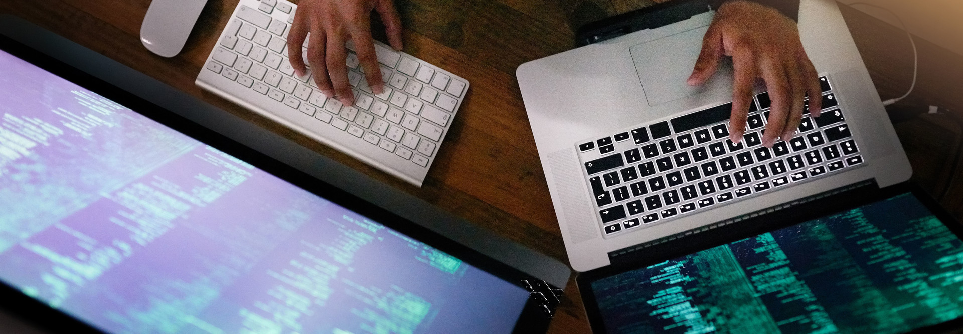 High angle shot of a person working on computer code