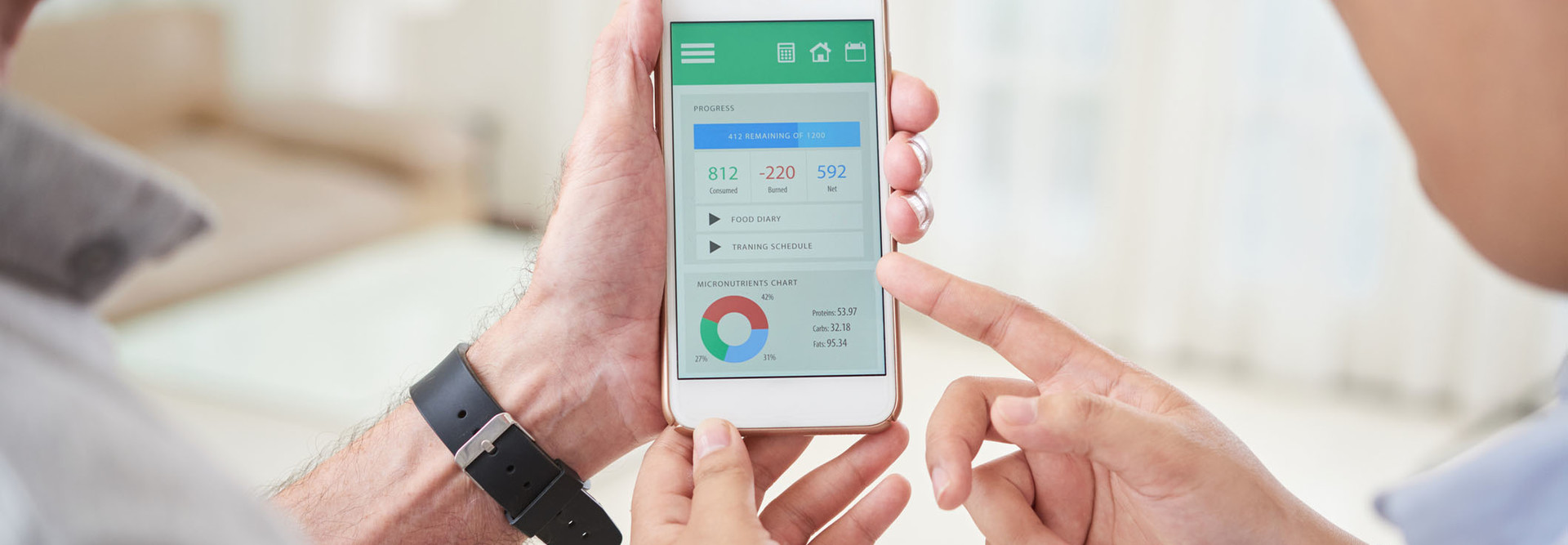 doctor and patient looking at health app