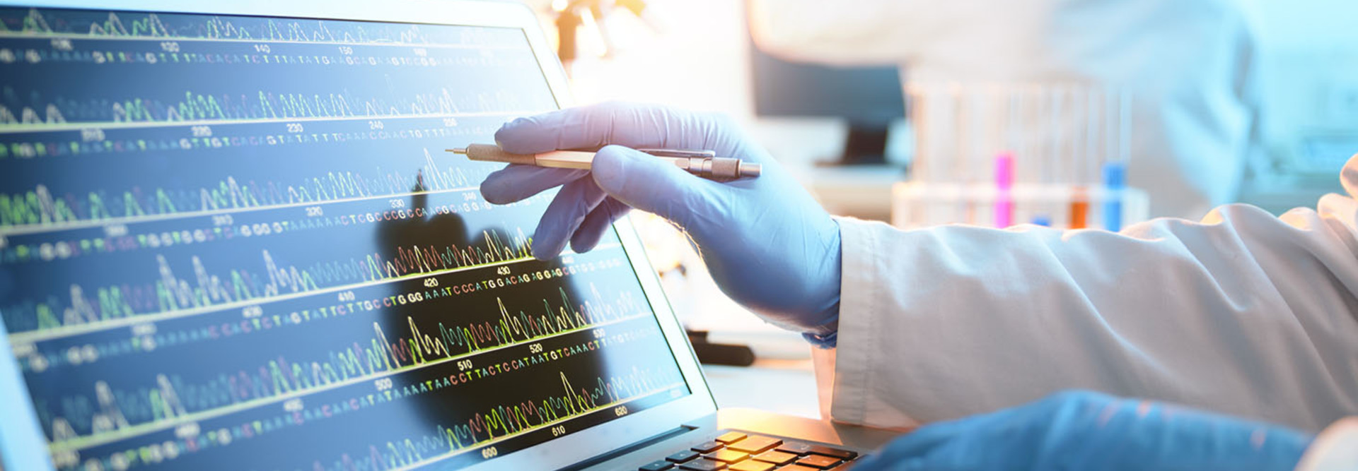 A scientist looking at a DNA sequence