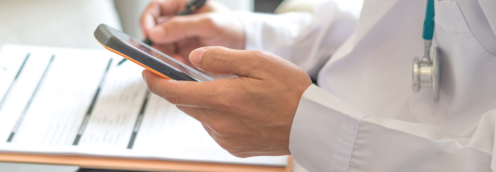 fessional medical doctor using tablet and smartphone for consult patient via online: Physician working tele-consultation 