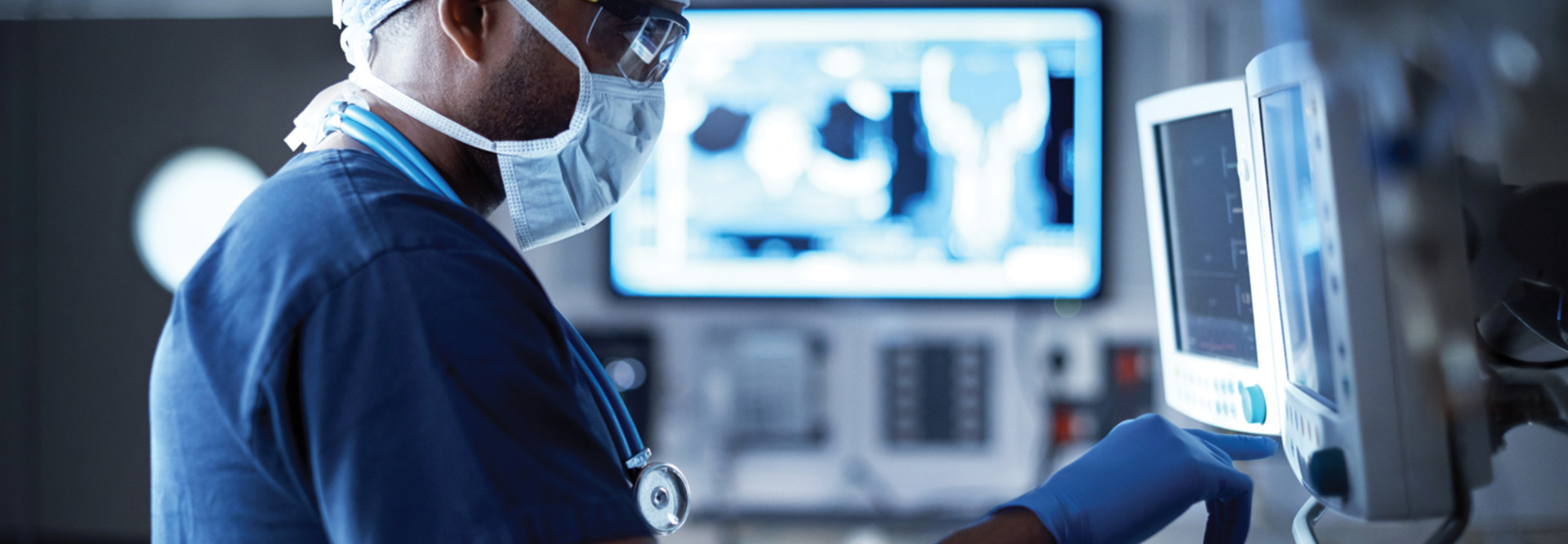 a doctor monitoring his patient's vitals