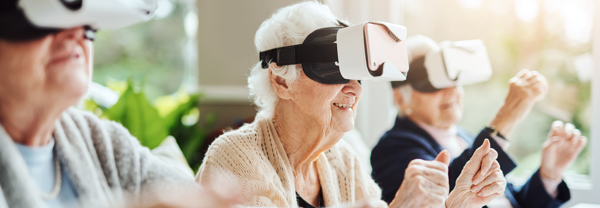 Seniors using VR headsets