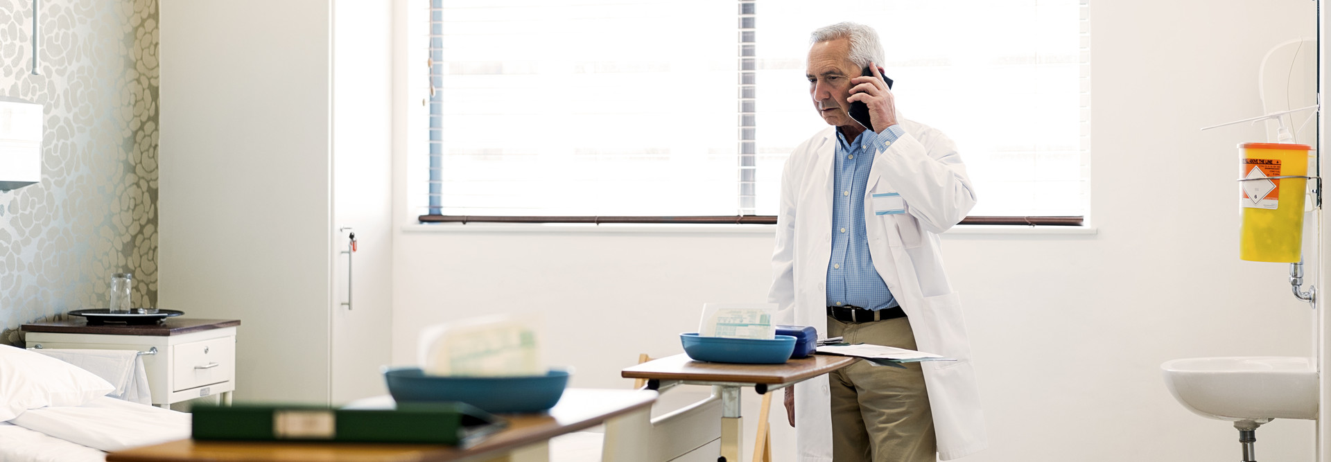 Doctor on cell phone