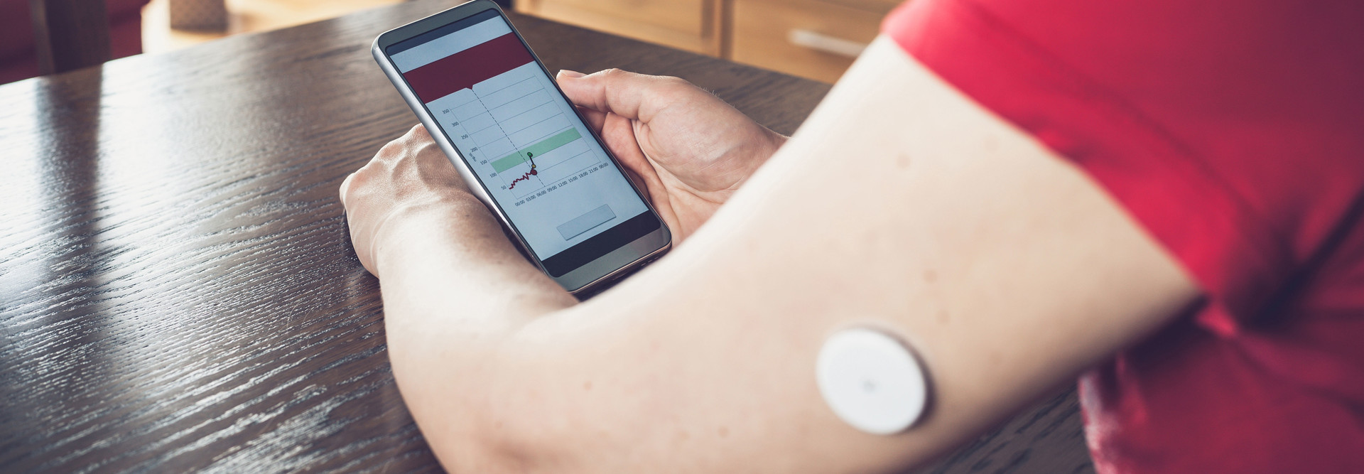 Woman monitors glucose levels