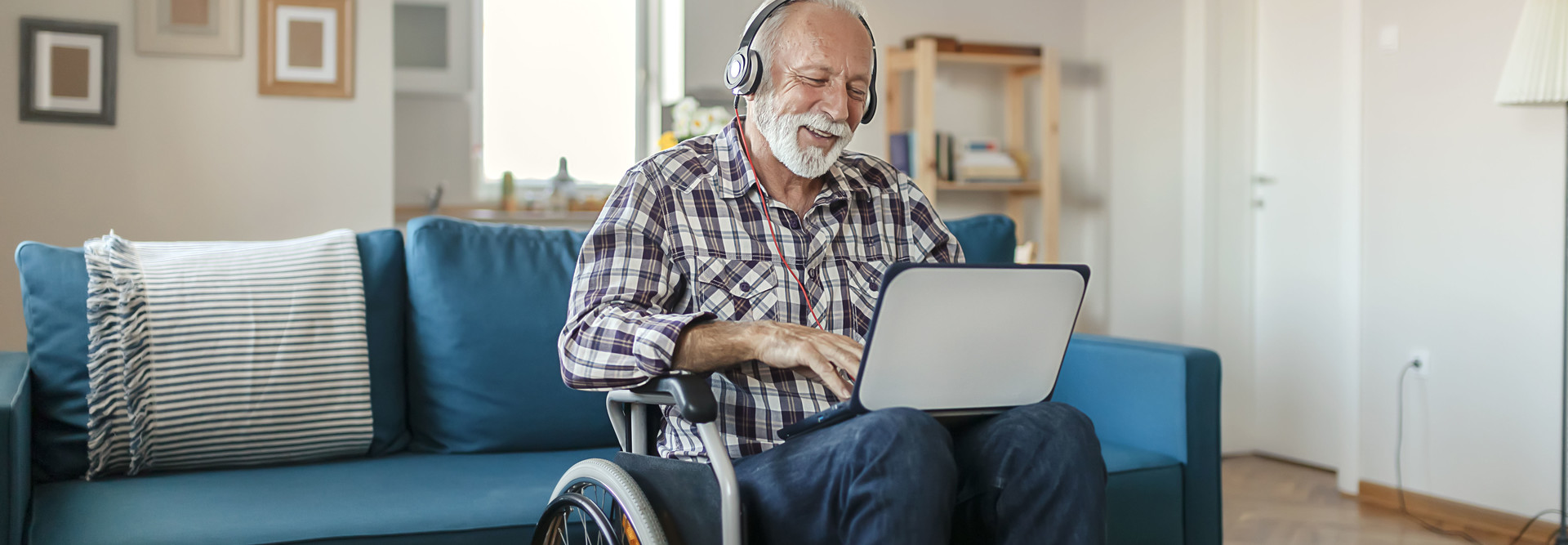 older adult with tablet computer