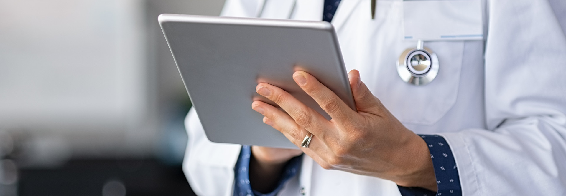 Doctor with tablet