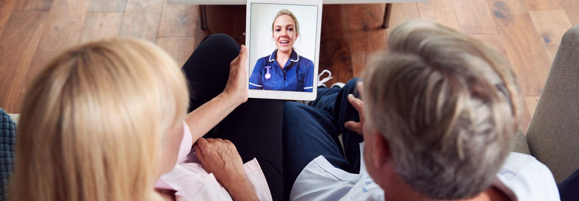 Doctor talks with patients