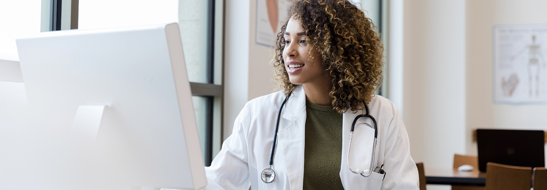 Female doctor on computer