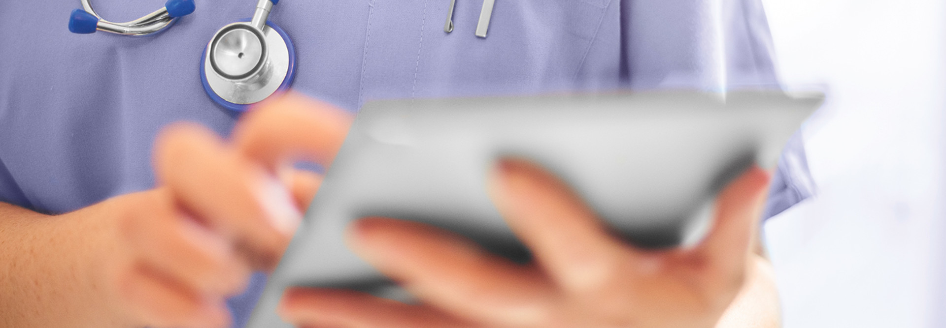 nurse using tablet