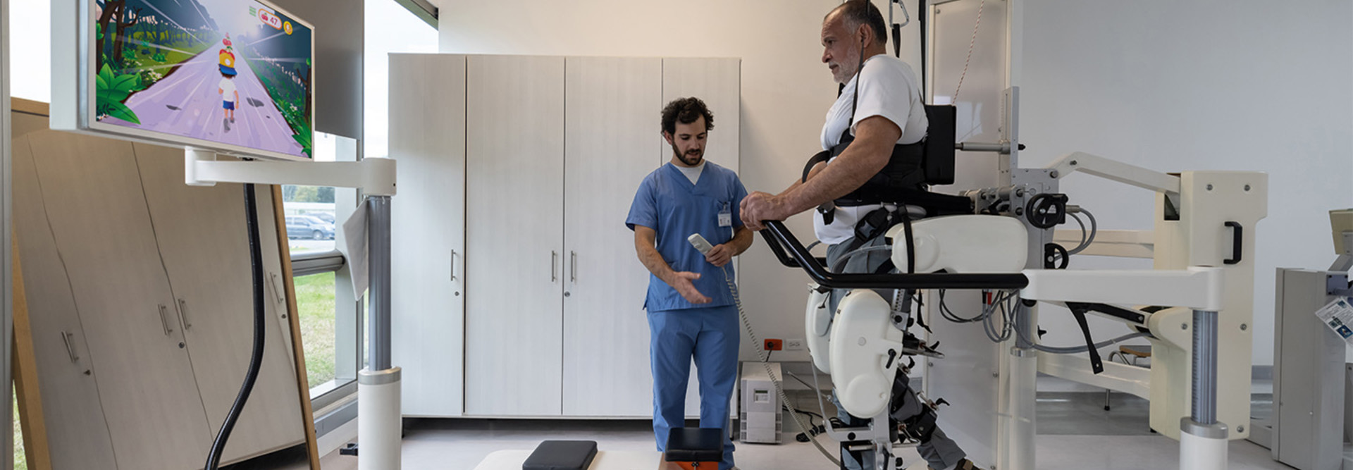 robot holds senior patient's weight during physical therapy