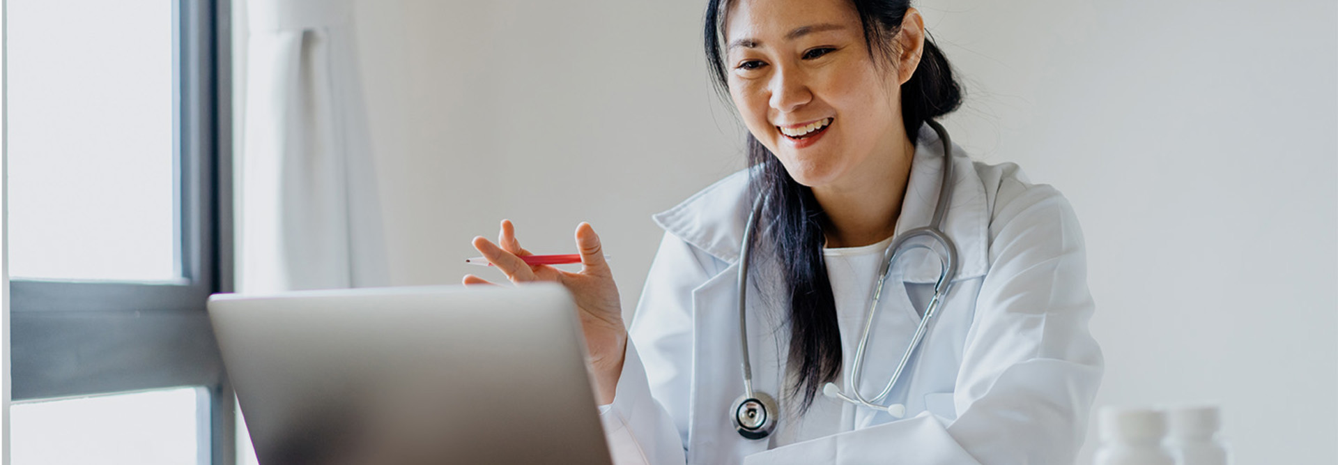 Doctor using laptop for telemedicine
