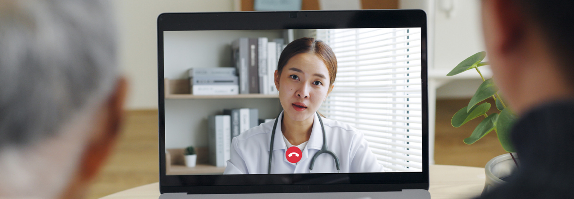 Doctor talking with patient virtually