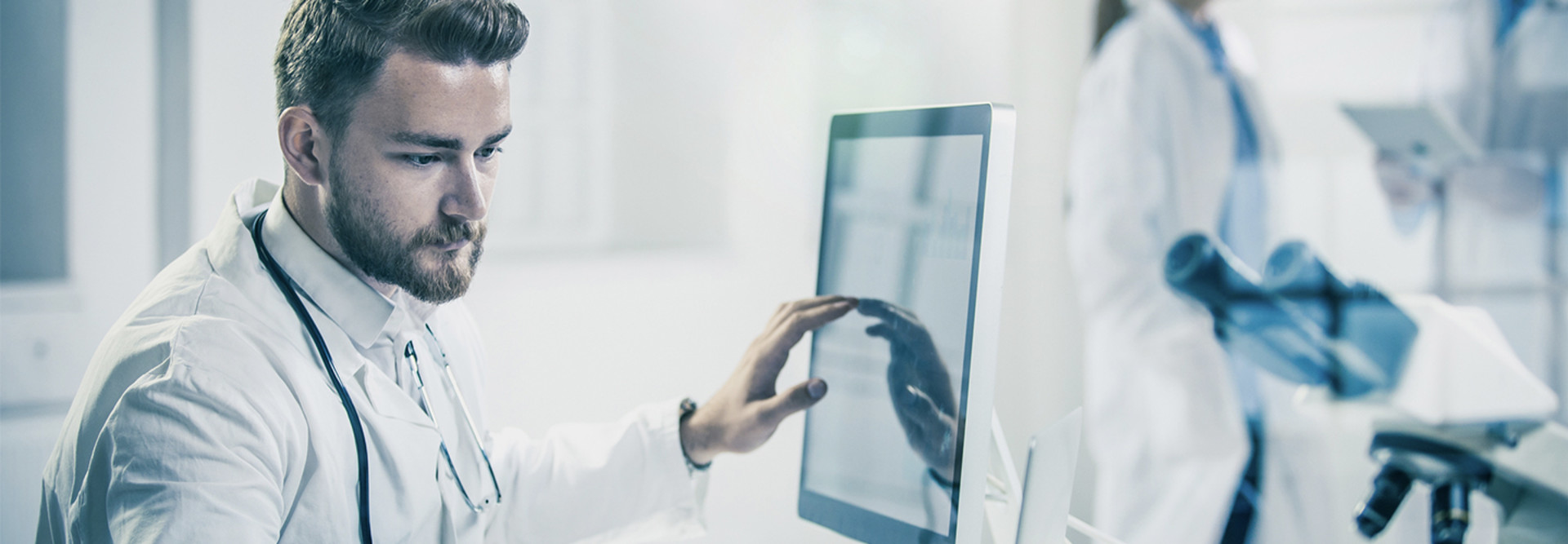 Doctor using computer in hospital