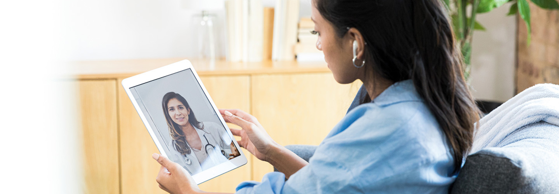 Woman has telehealth consultation with her doctor
