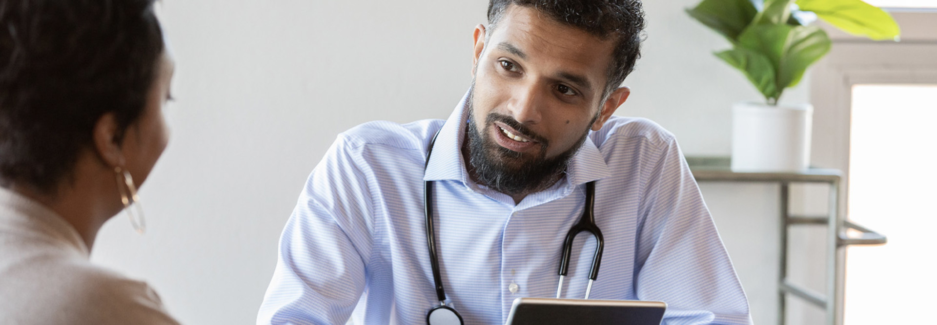 Doctor and patient talking during appointment