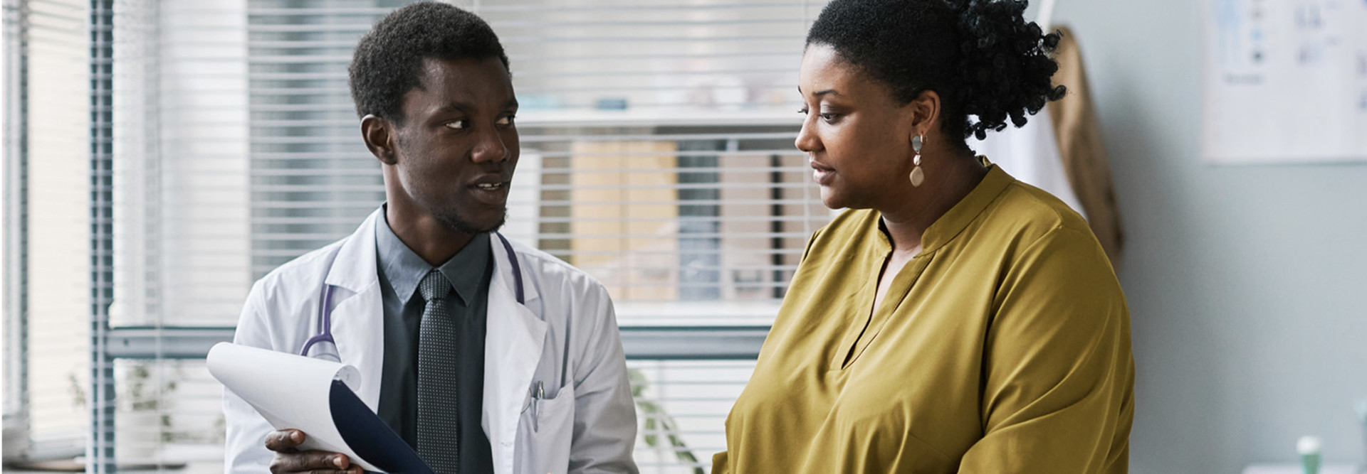 Patient and doctor talking together