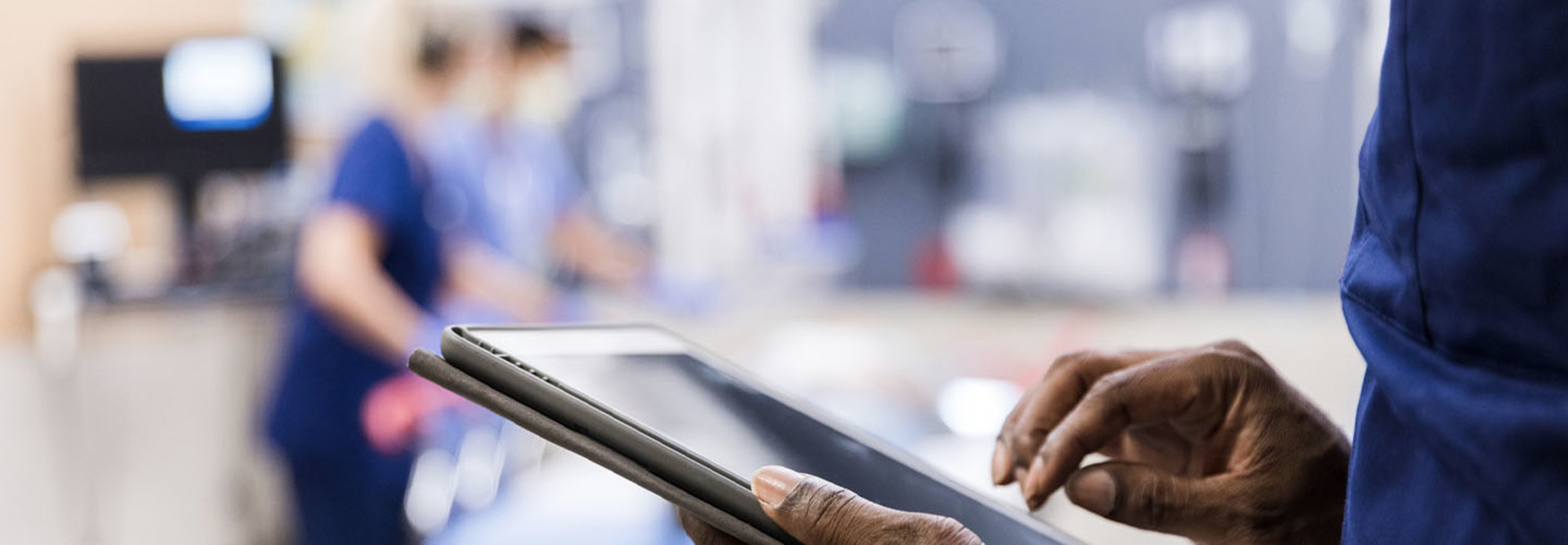 Medical worker using tablet