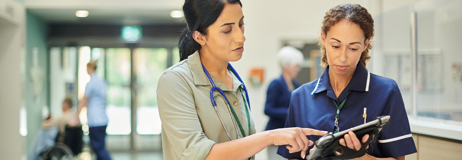 Hospital colleagues using technology