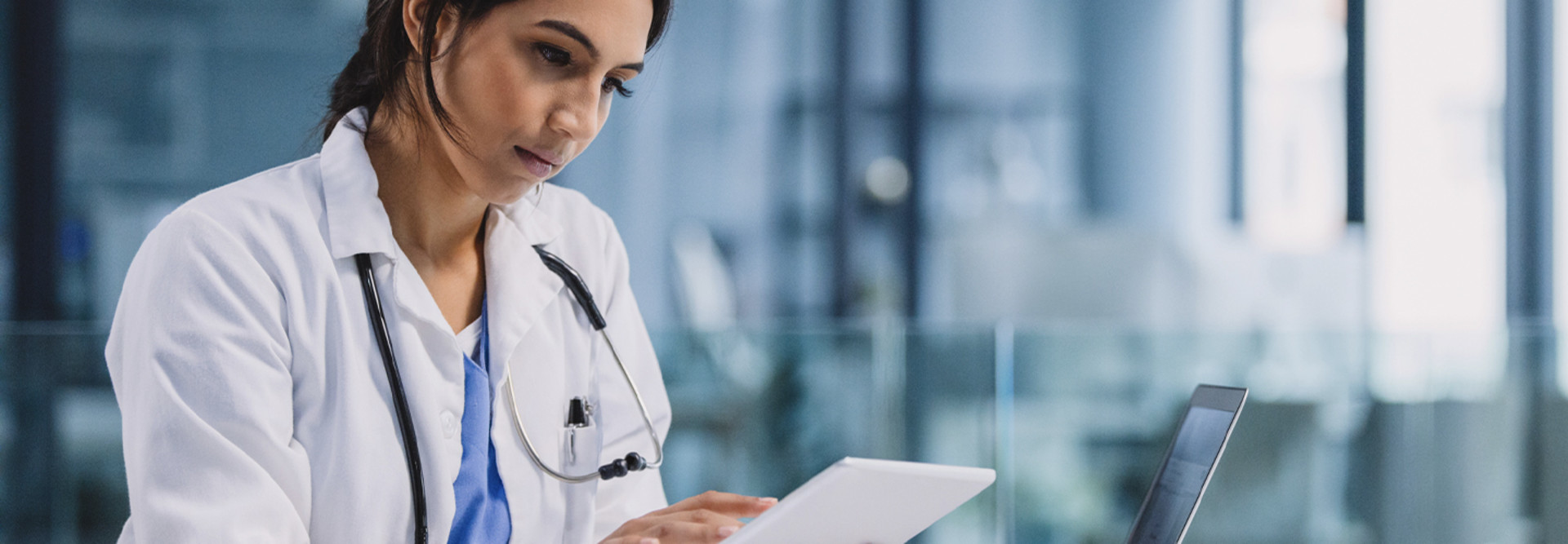 Doctor using devices