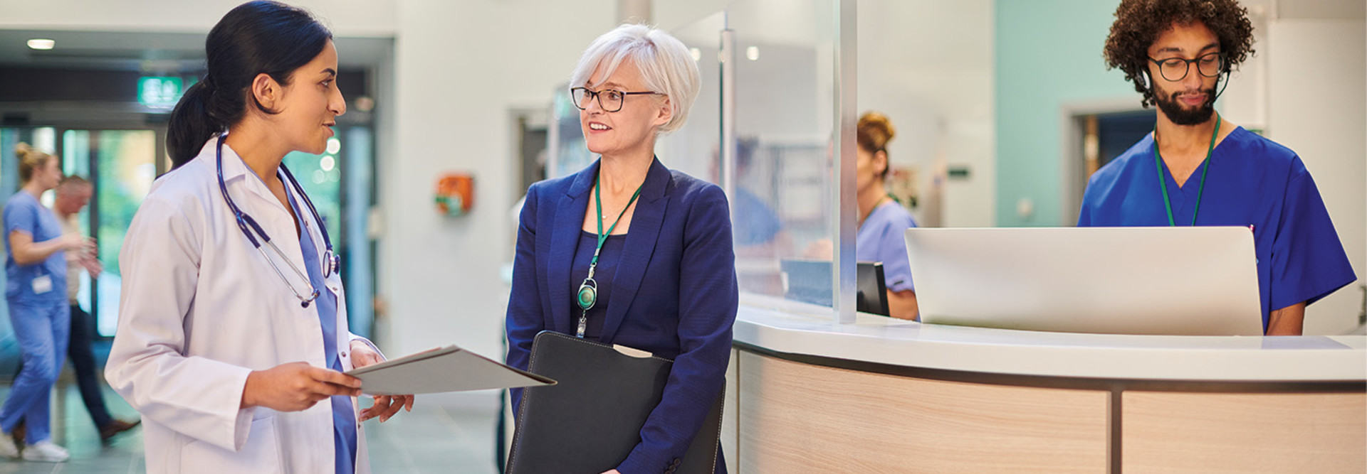 hospital administrator talking to a physician