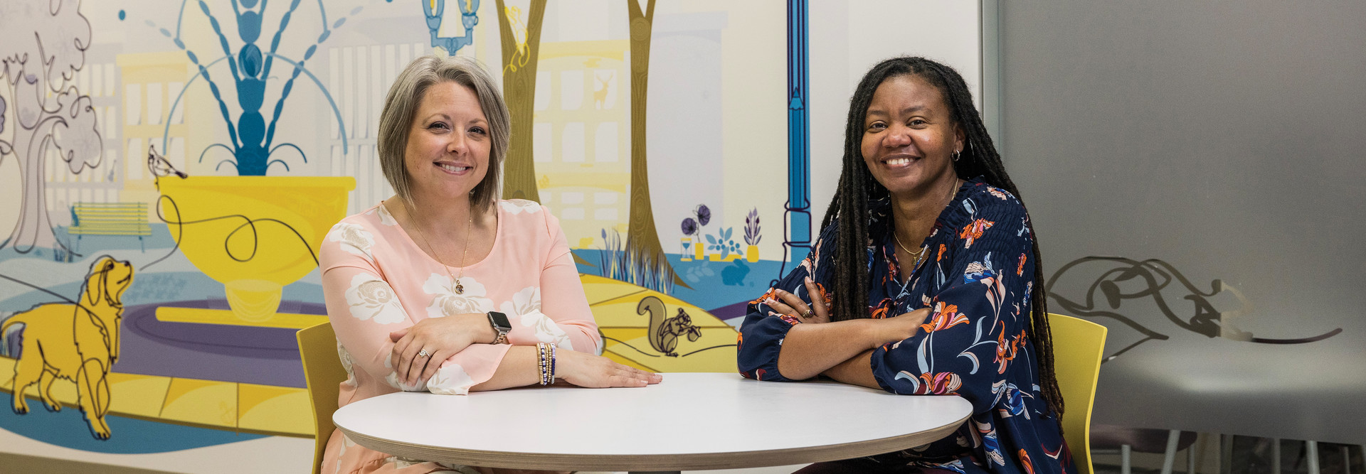 Quality Initiative Specialist Erin Pitchure (left) and Clinical Informatics Specialist Ericka Moore worked together to build a new analytics system at Akron Children's in Ohio.