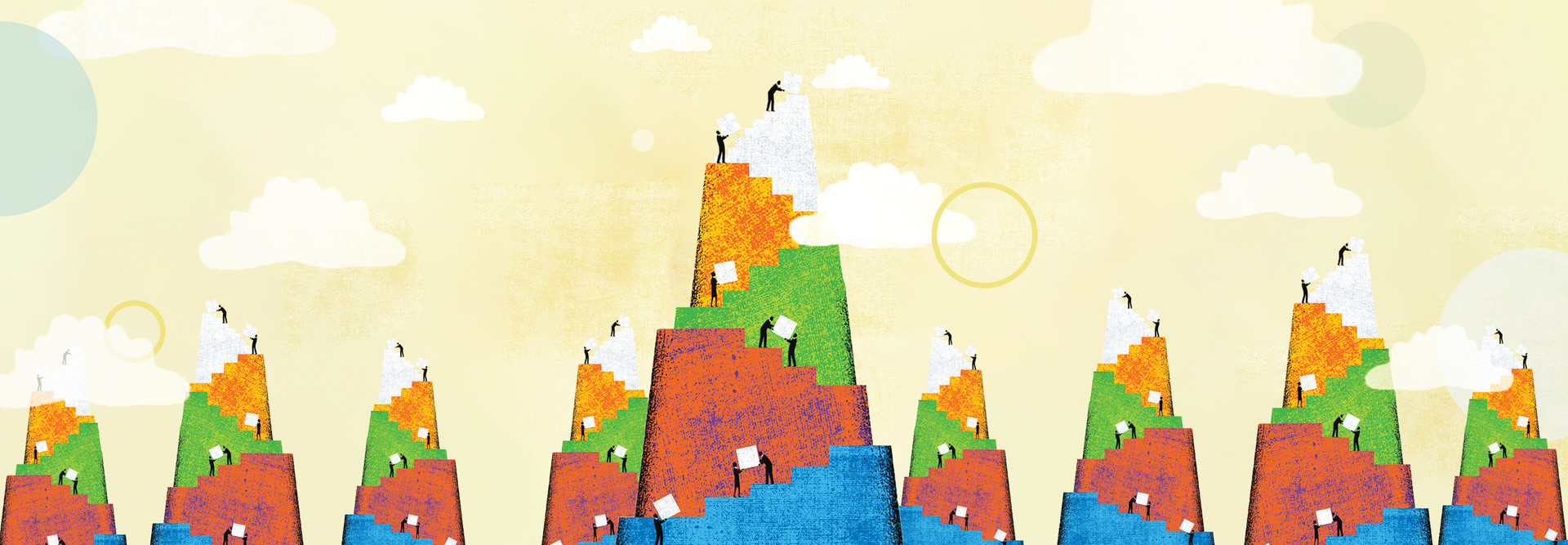 people working together to build mountains out of blocks