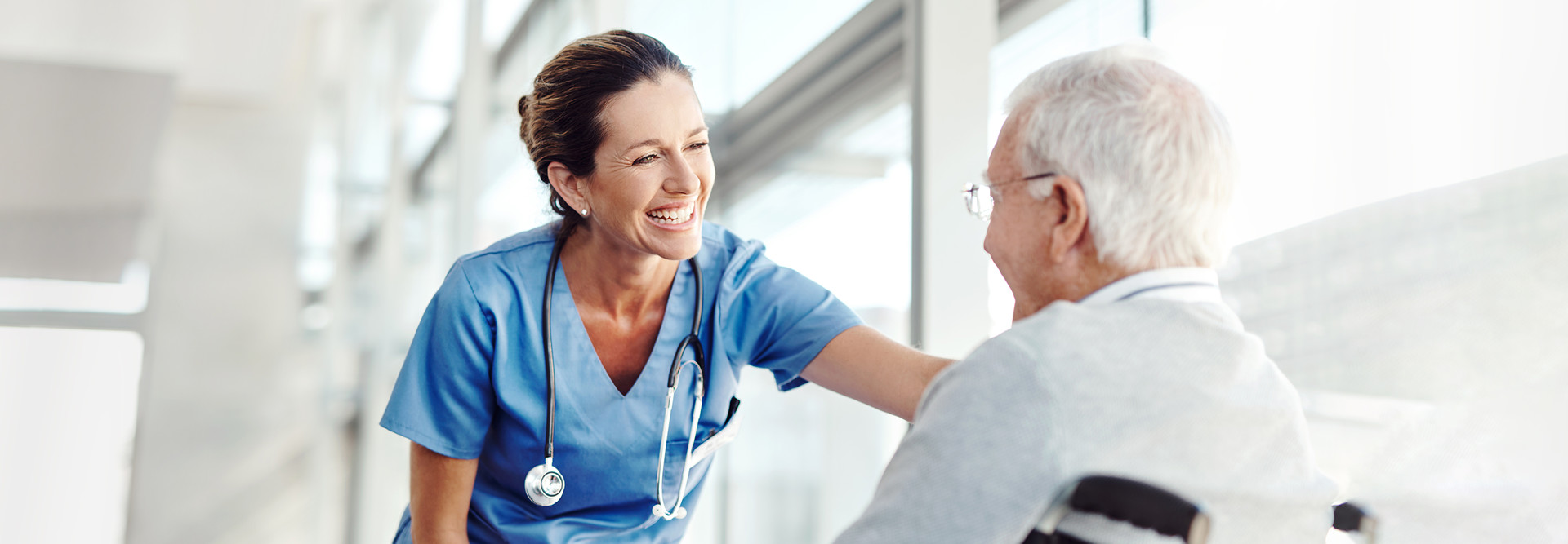 Nurse helping an elderly patient