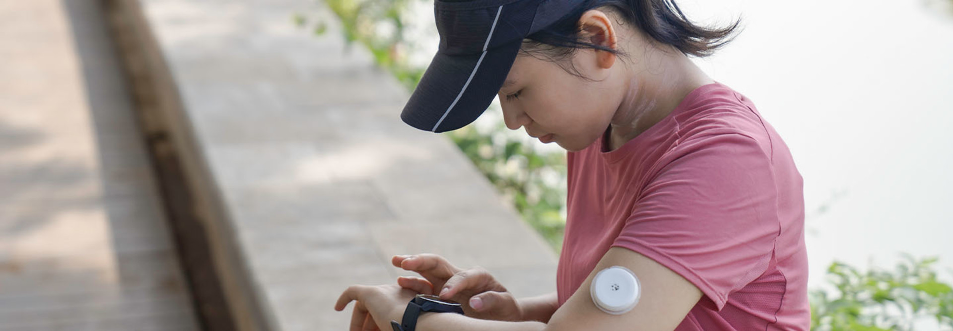 Person wearing glucose monitor 