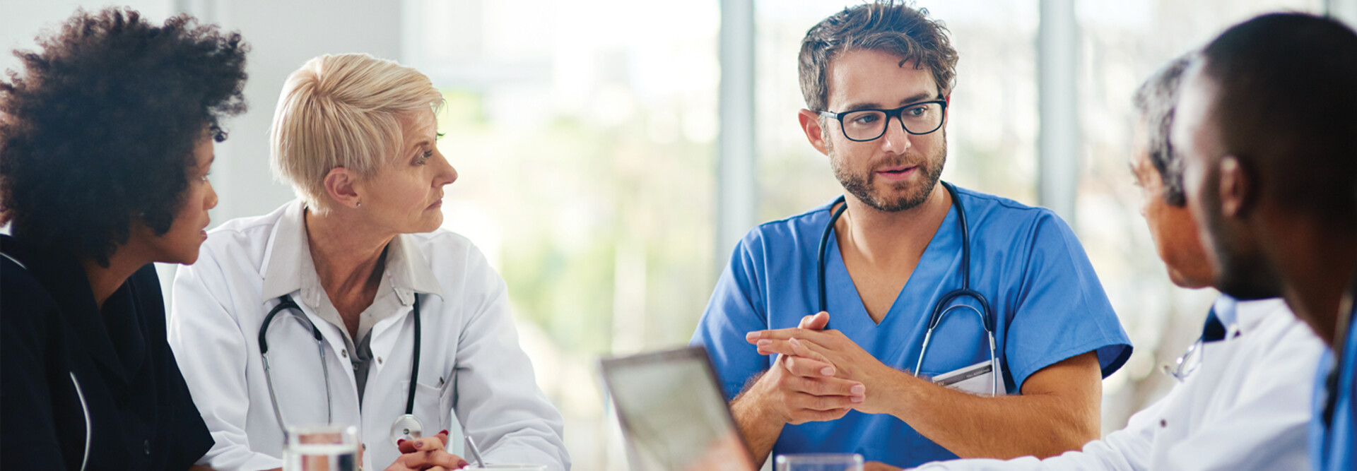 Healthcare team discussing at a table