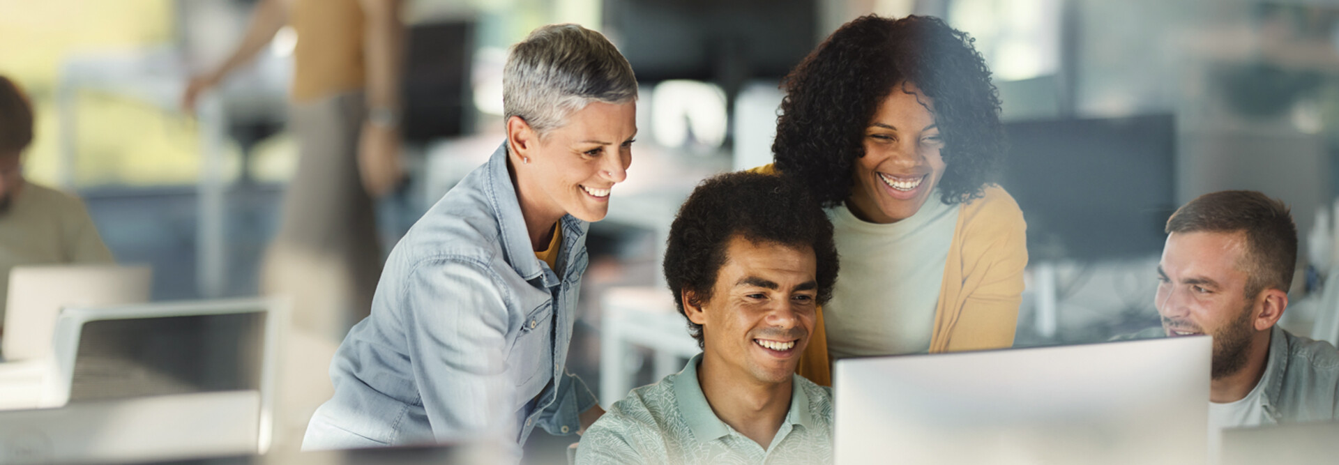 Coworkers collaborating in the office