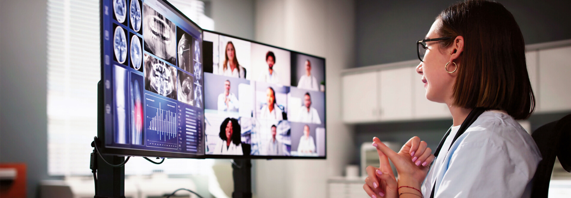 doctor on video call with several care team members