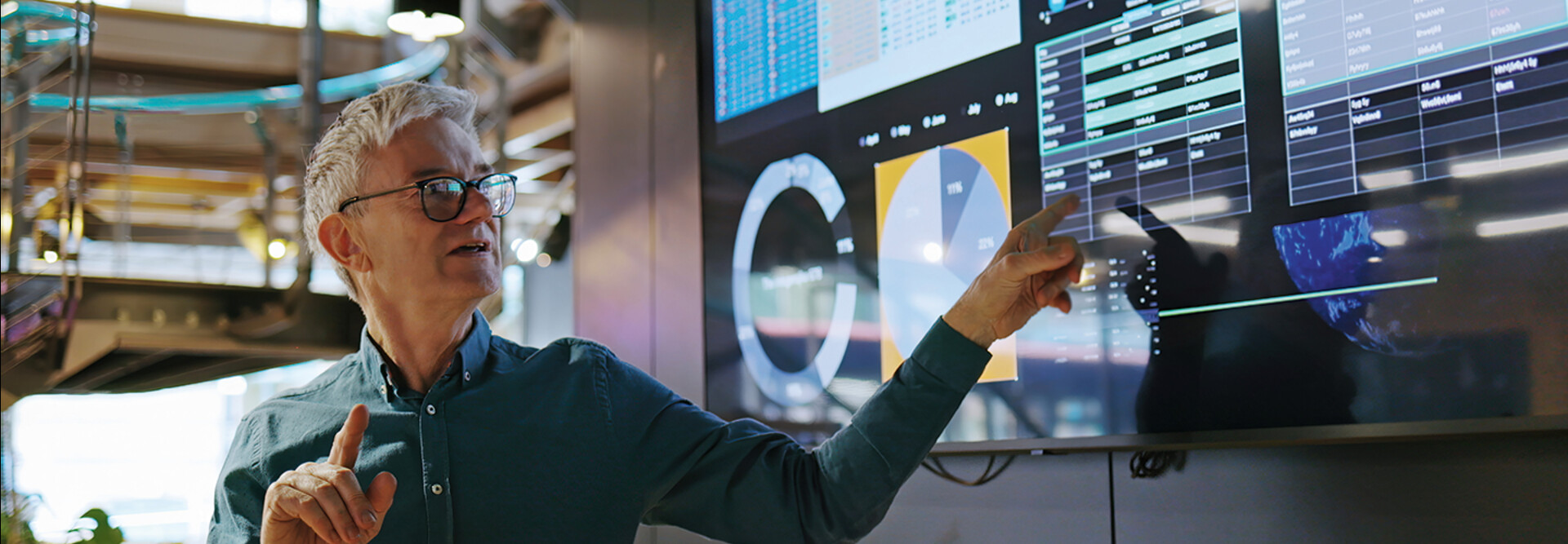 scientist explains data on big screen