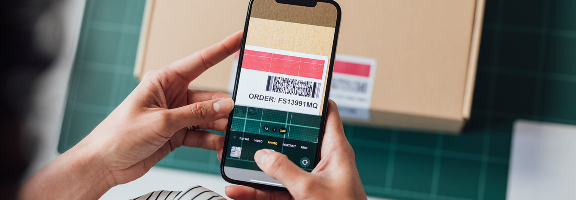 person scans barcode with phone