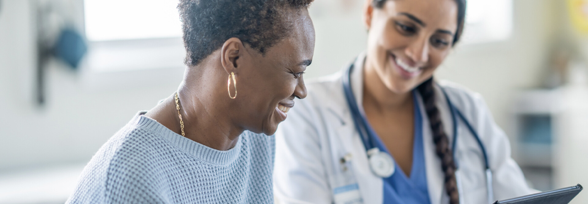 Doctor speaking with patient