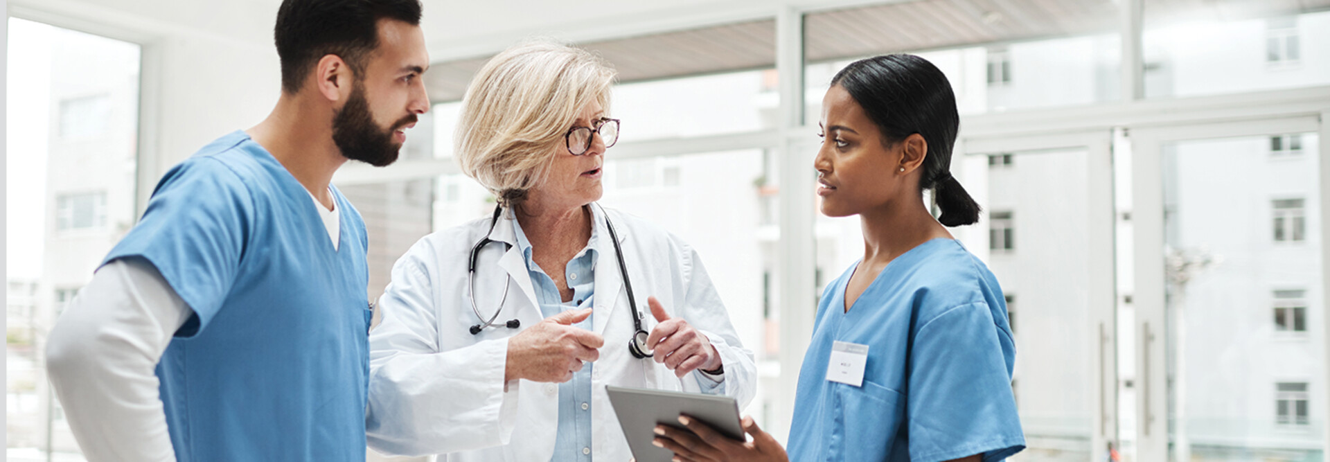 Care Team Collaborates with Data on Tables