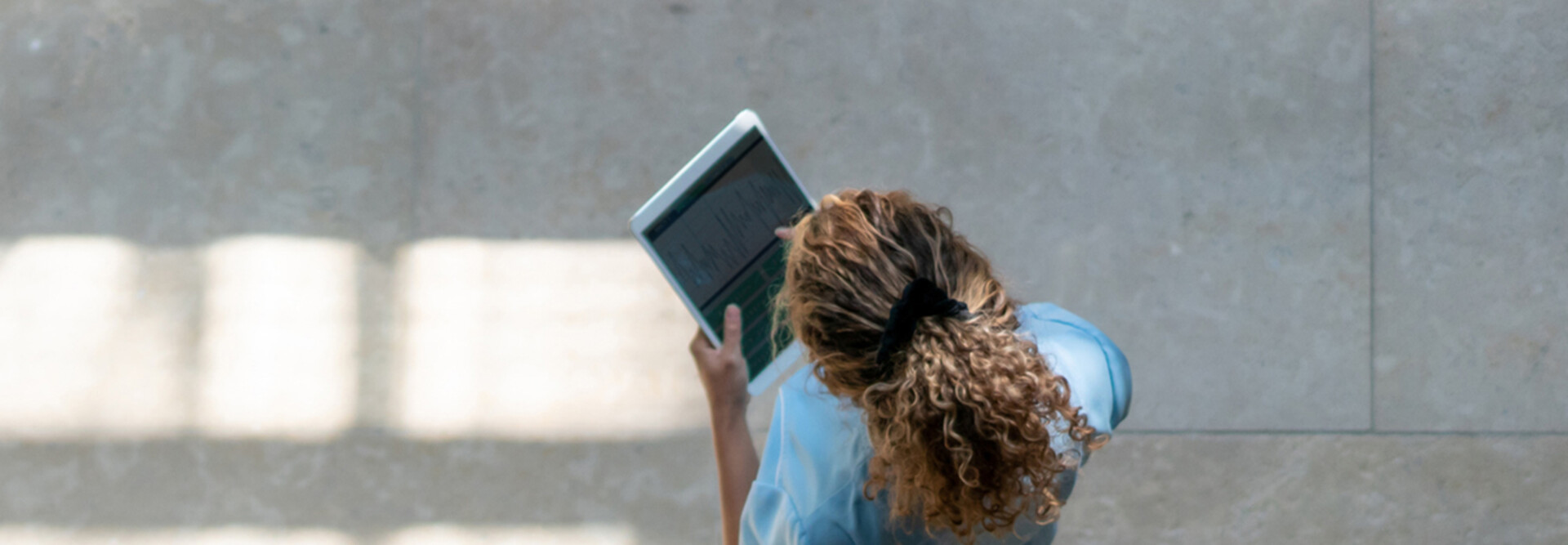 Nurse using tablet in hospital