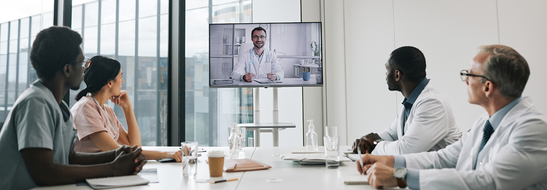 care team speaks with physician over conference call