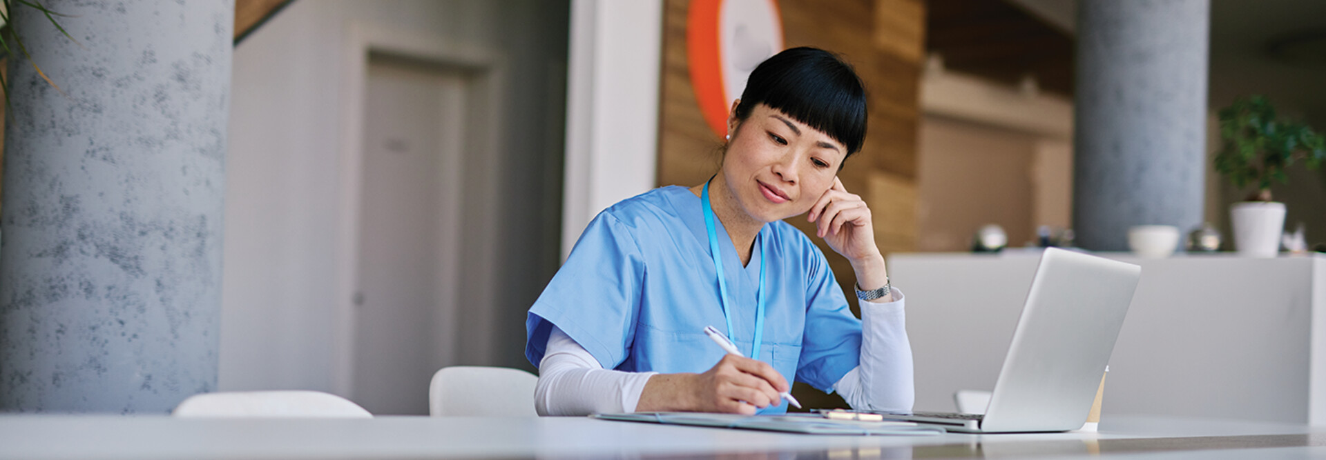 nurse studying on computer