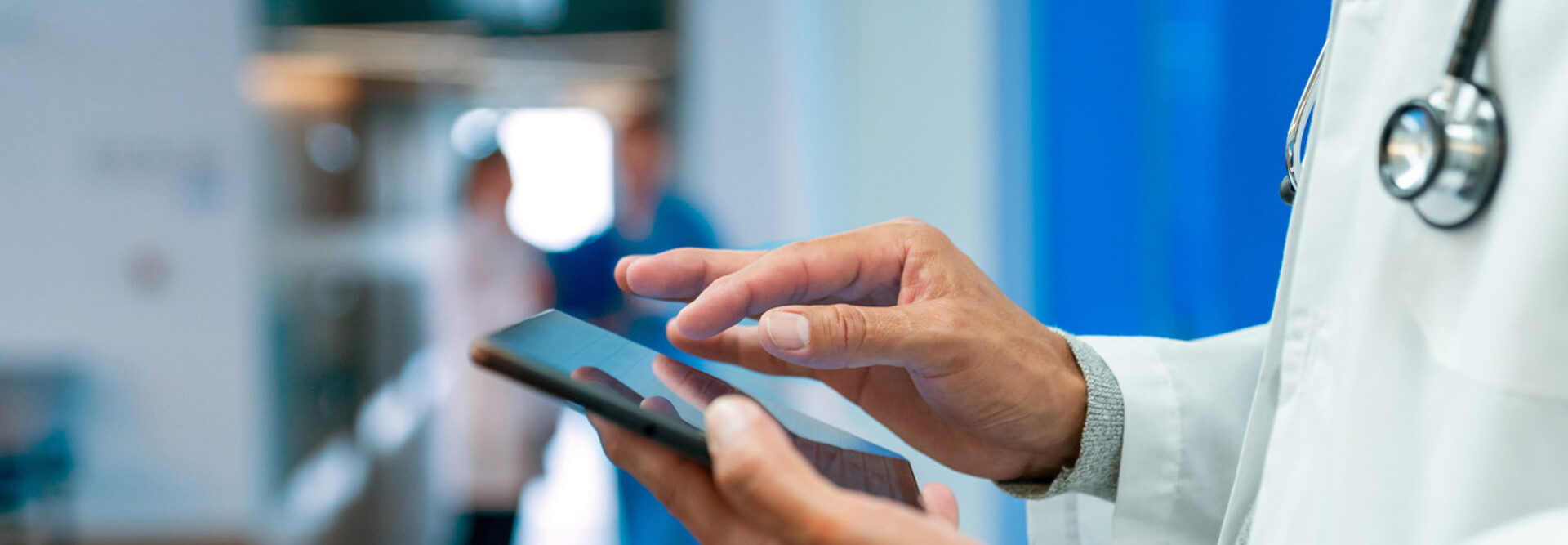 Doctor using tablet