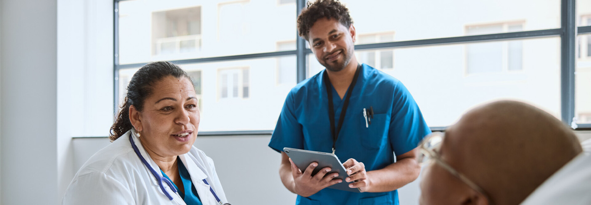Doctors engaging with patient