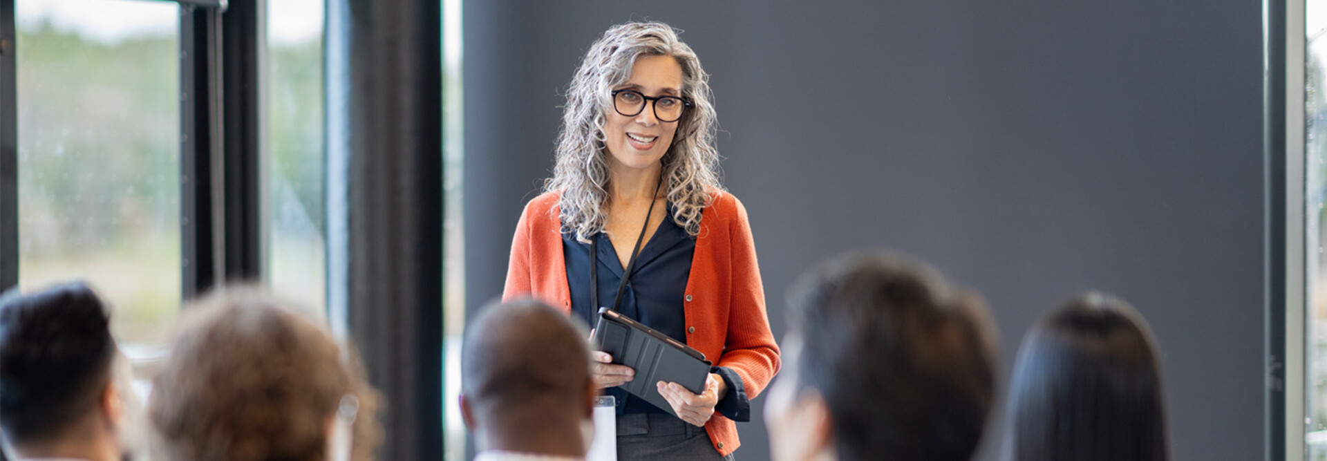 Person presenting at conference