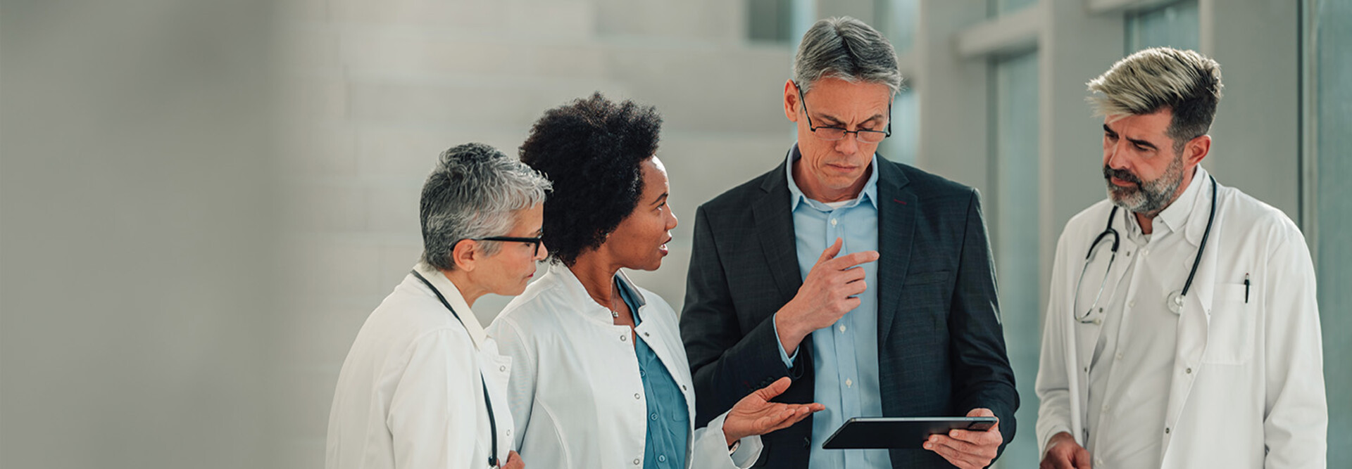 healthcare executive collaborates with physicians