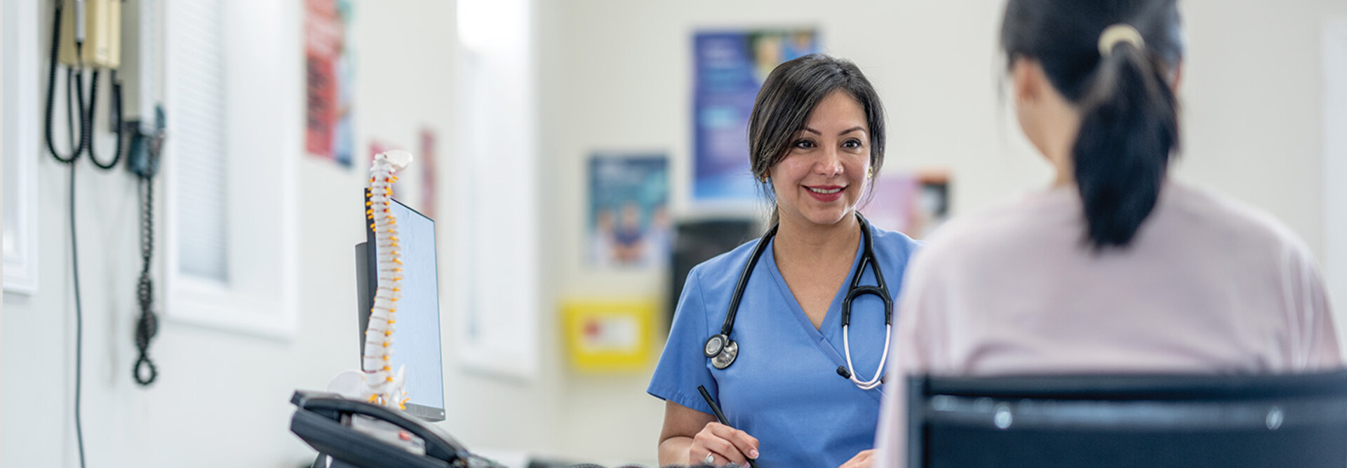 nurse talks to patient